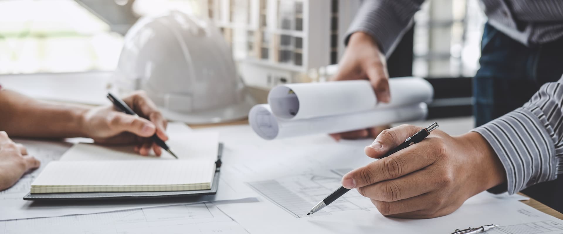 Architects Designing A Building